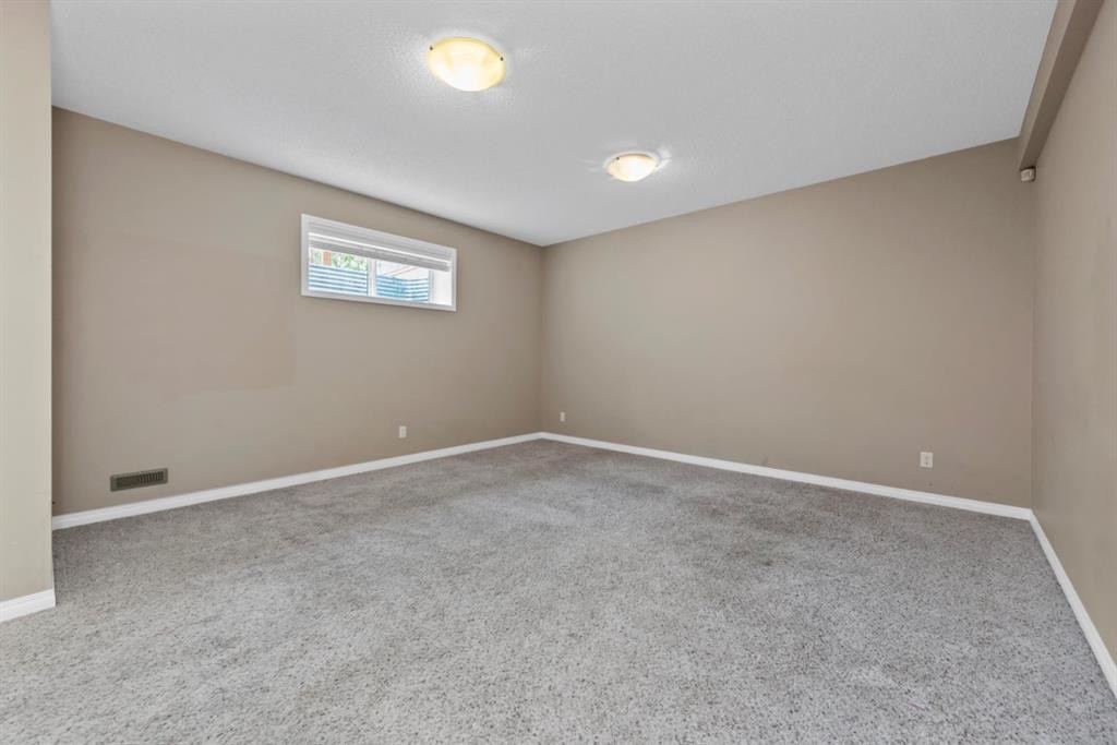 203 Morningside Circle Sw, Airdrie, AB - Indoor Photo Showing Other Room