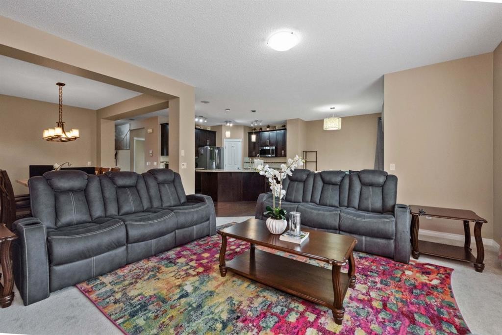 203 Morningside Circle Sw, Airdrie, AB - Indoor Photo Showing Living Room
