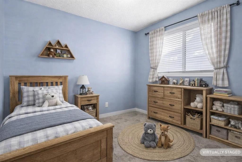 72 Marquis Place Se, Airdrie, AB - Indoor Photo Showing Bedroom