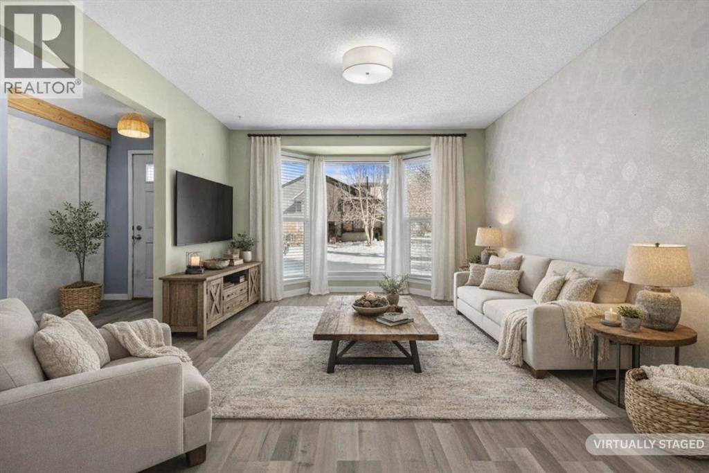 72 Marquis Place Se, Airdrie, AB - Indoor Photo Showing Living Room