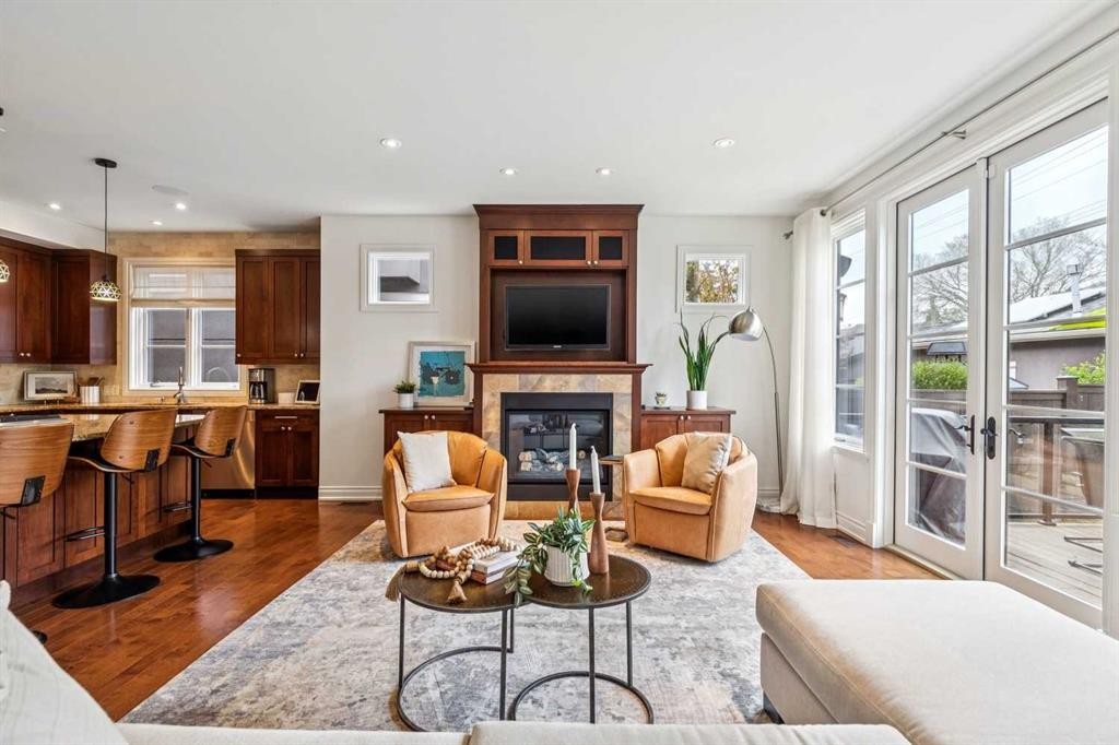 2228 Broadview Road Nw, Calgary, AB - Indoor Photo Showing Living Room With Fireplace