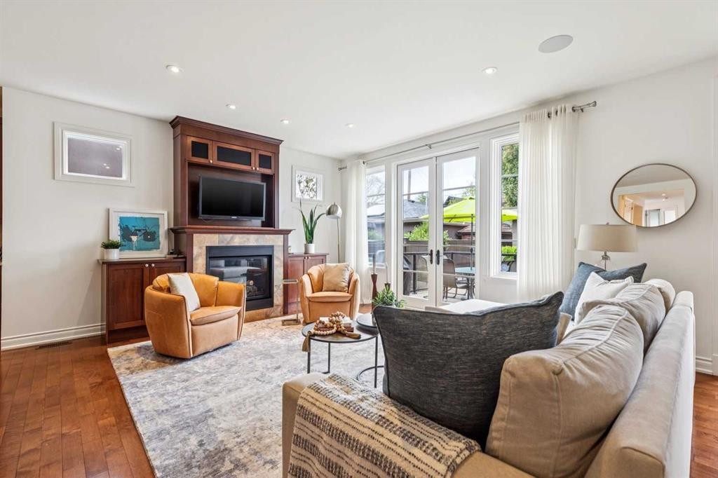 2228 Broadview Road Nw, Calgary, AB - Indoor Photo Showing Living Room With Fireplace