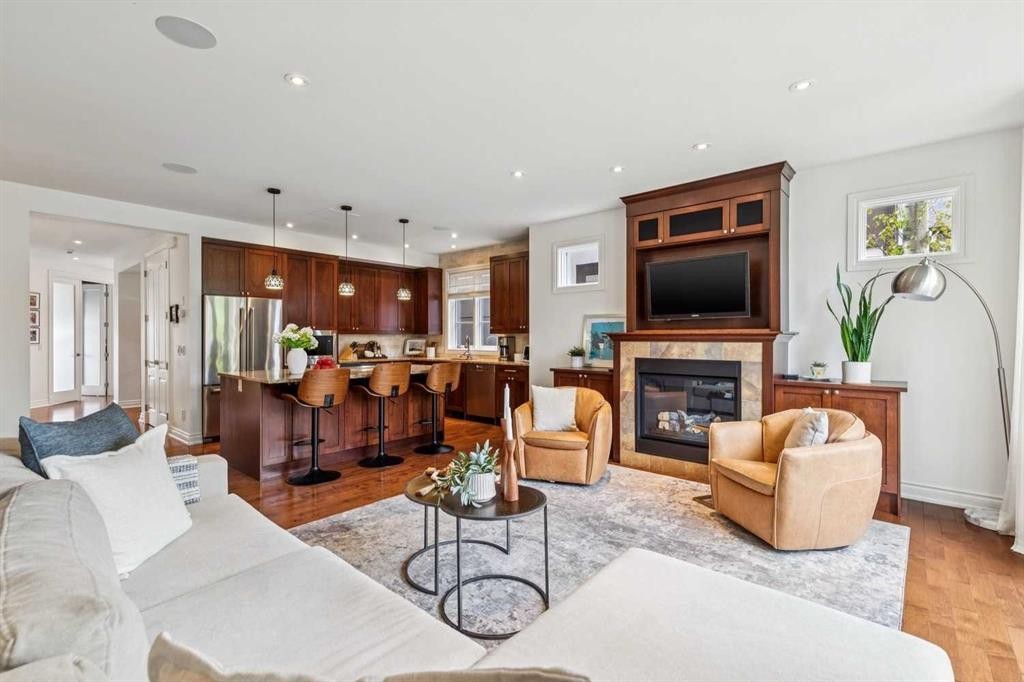 2228 Broadview Road Nw, Calgary, AB - Indoor Photo Showing Living Room With Fireplace