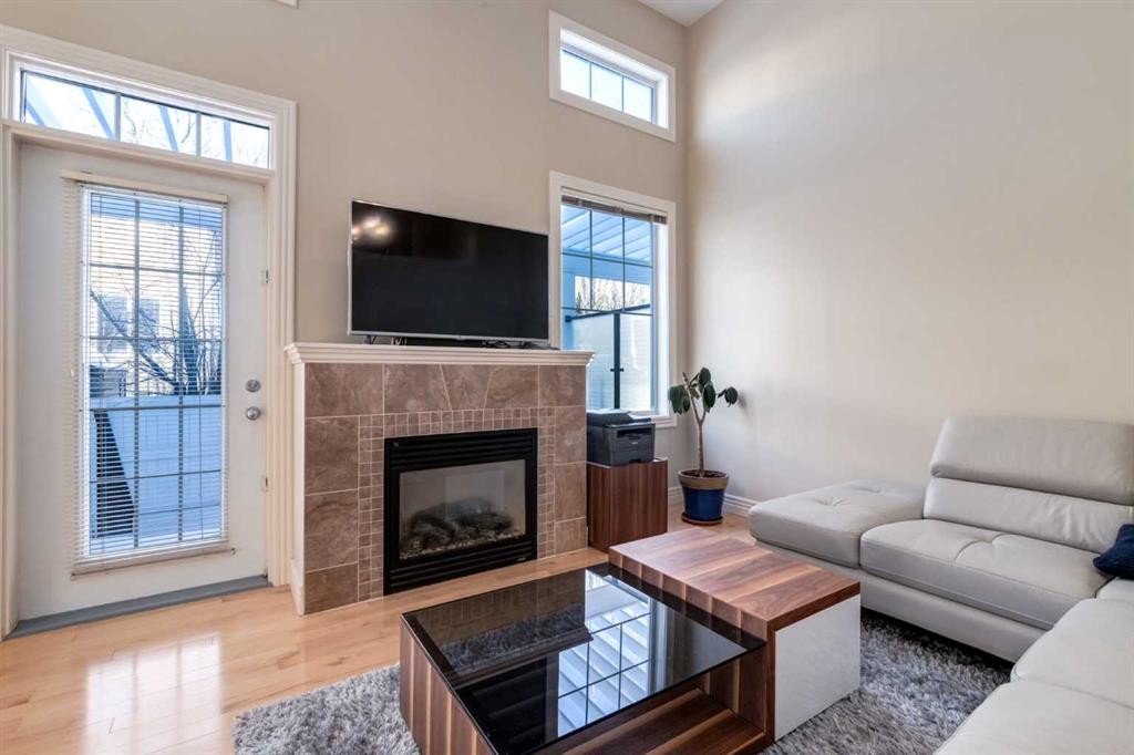 37 Royal Oak Plaza Nw, Calgary, AB - Indoor Photo Showing Living Room With Fireplace