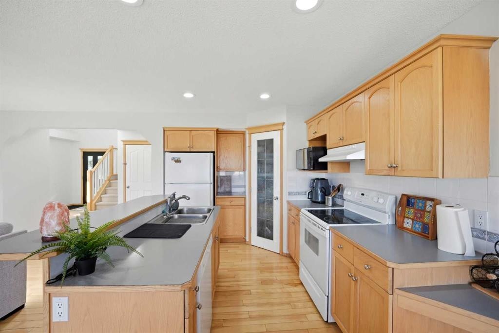 101 Coville Crescent Ne, Calgary, AB - Indoor Photo Showing Kitchen With Double Sink