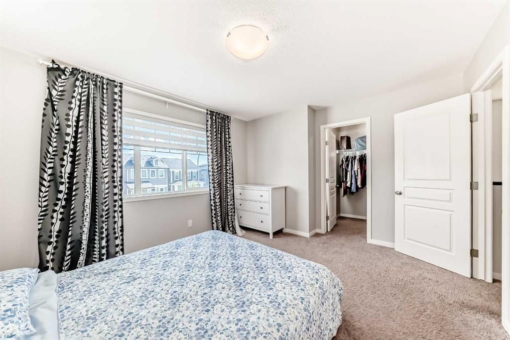 151 Copperpond Rise Se, Calgary, AB - Indoor Photo Showing Bedroom