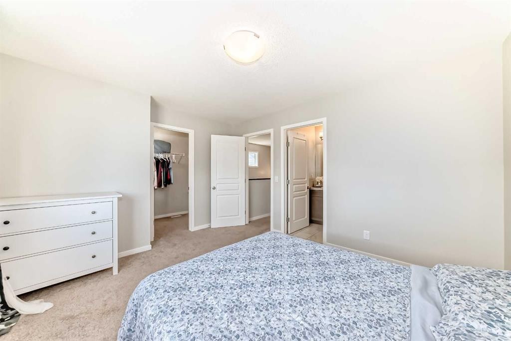 151 Copperpond Rise Se, Calgary, AB - Indoor Photo Showing Bedroom