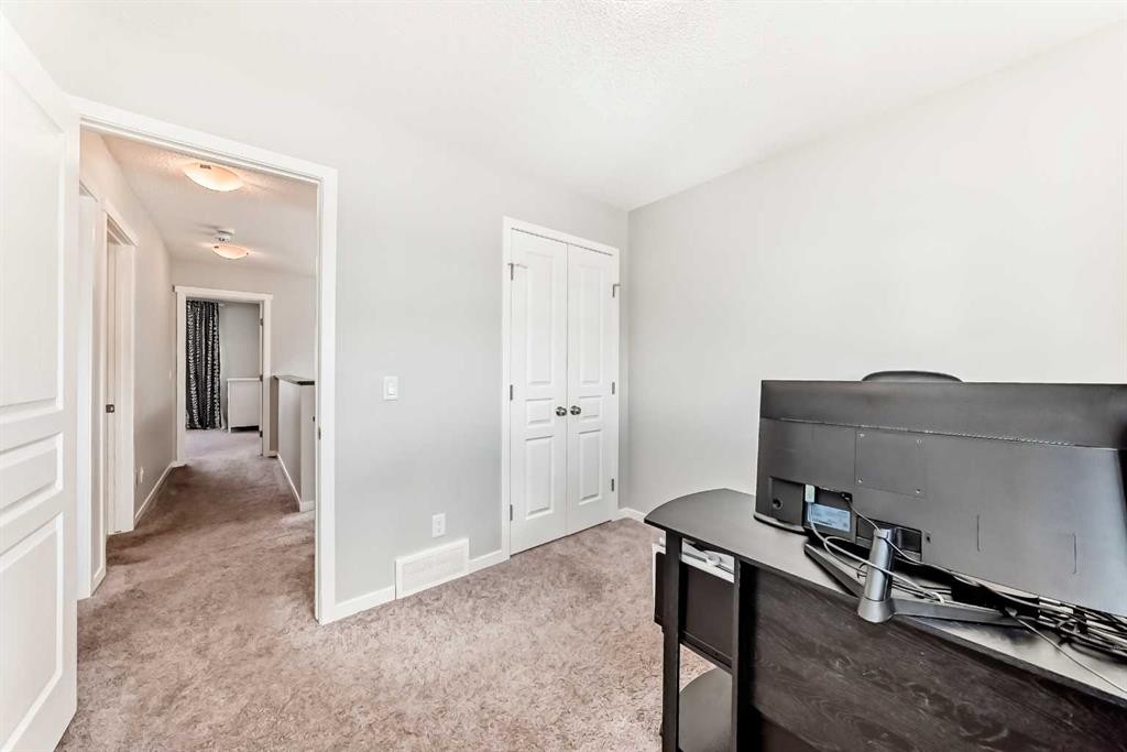 151 Copperpond Rise Se, Calgary, AB - Indoor Photo Showing Other Room