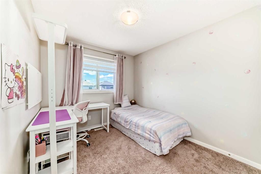 151 Copperpond Rise Se, Calgary, AB - Indoor Photo Showing Bedroom