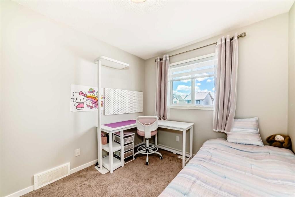151 Copperpond Rise Se, Calgary, AB - Indoor Photo Showing Bedroom