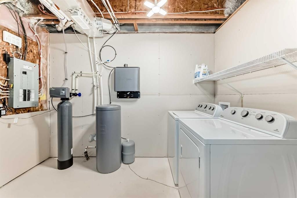 151 Copperpond Rise Se, Calgary, AB - Indoor Photo Showing Laundry Room