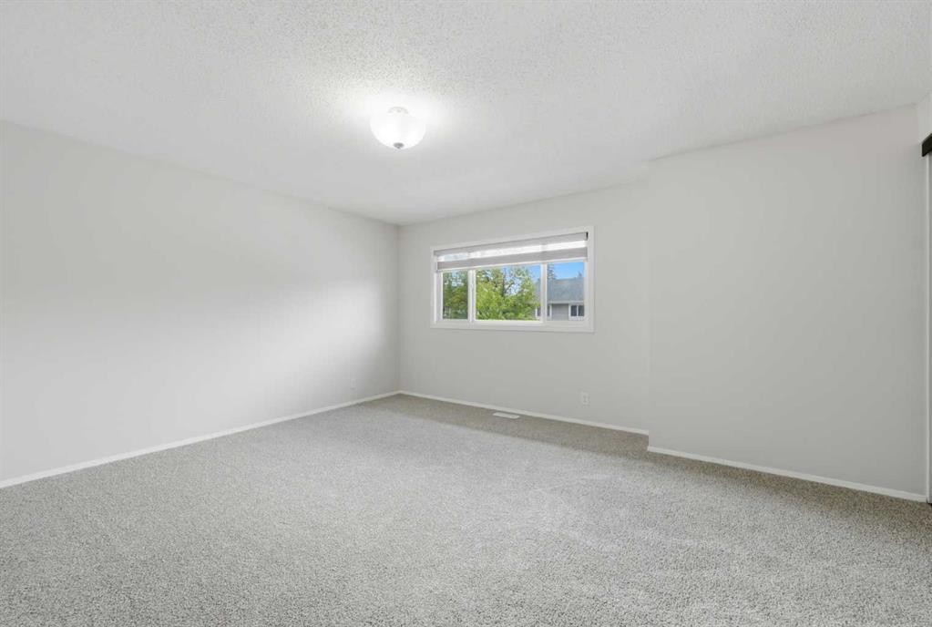 36 Falconer Terrace Ne, Calgary, AB - Indoor Photo Showing Other Room