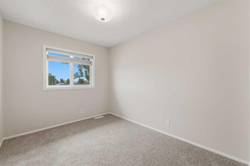 36 Falconer Terrace Ne, Calgary, AB - Indoor Photo Showing Other Room