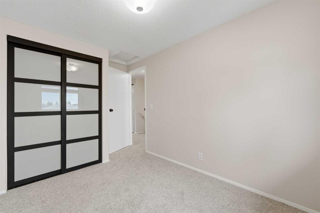 36 Falconer Terrace Ne, Calgary, AB - Indoor Photo Showing Other Room