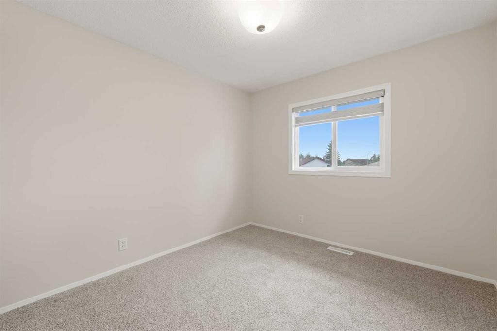 36 Falconer Terrace Ne, Calgary, AB - Indoor Photo Showing Other Room