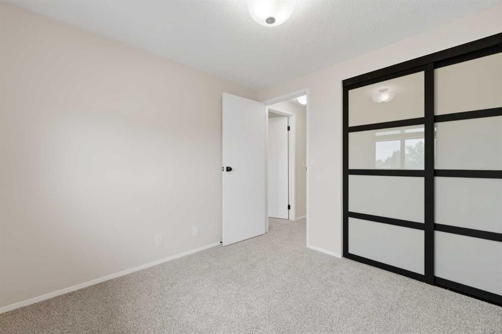 36 Falconer Terrace Ne, Calgary, AB - Indoor Photo Showing Other Room