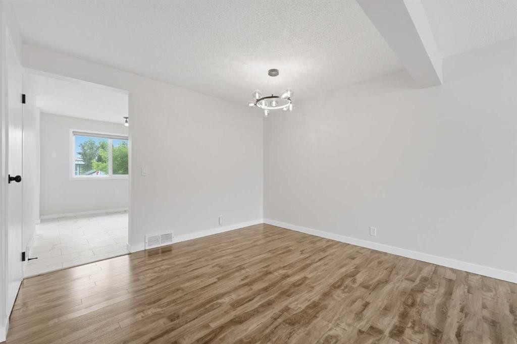 36 Falconer Terrace Ne, Calgary, AB - Indoor Photo Showing Other Room