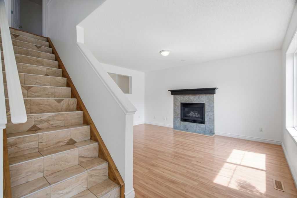 690 Coventry Drive Ne, Calgary, AB - Indoor With Fireplace