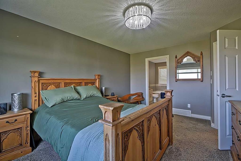 732 Hampton Hills Drive Ne, High River, AB - Indoor Photo Showing Bedroom
