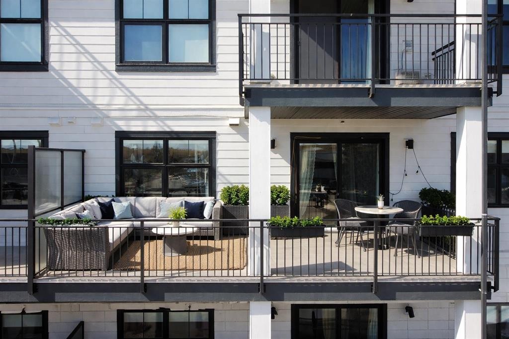 208-255 Les Jardins Park Se, Calgary, AB - Outdoor With Balcony With Exterior