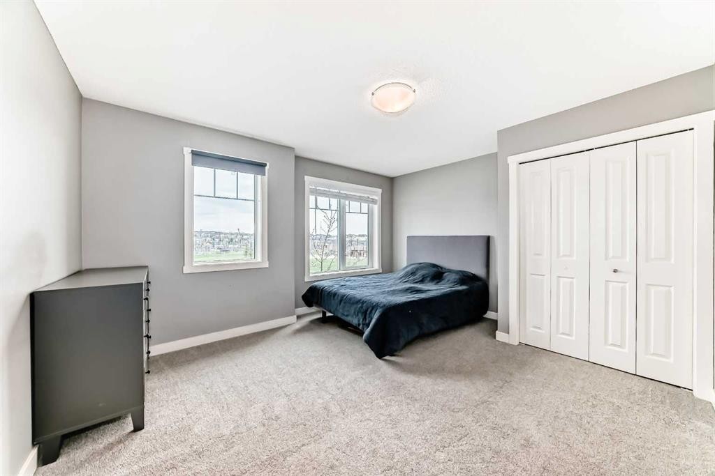 49 Aspen Hills Drive Sw, Calgary, AB - Indoor Photo Showing Bedroom