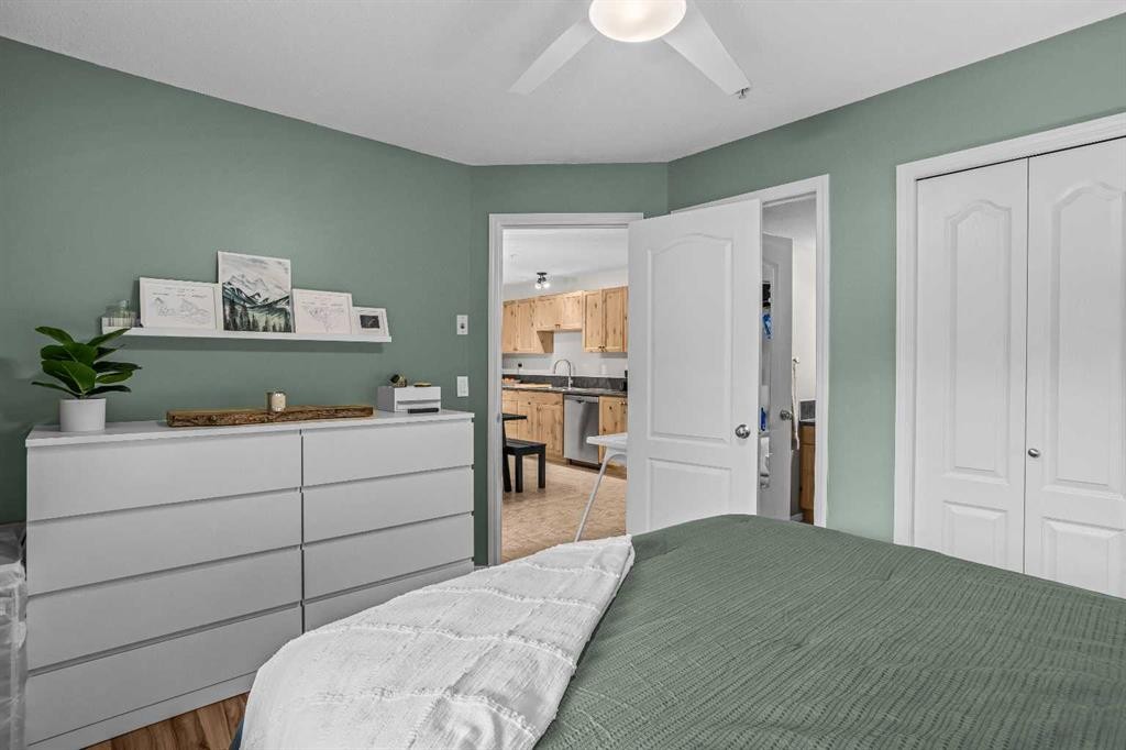 111-300 Palliser, Canmore, AB - Indoor Photo Showing Bedroom