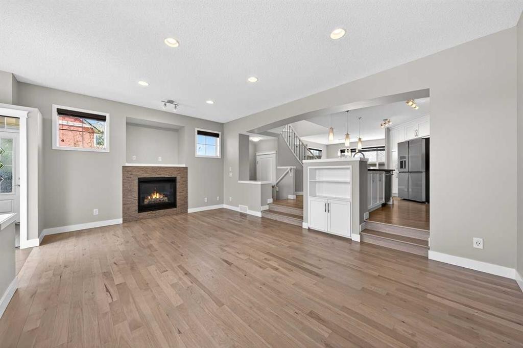 108 Auburn Crest Park Se, Calgary, AB - Indoor Photo Showing Living Room With Fireplace