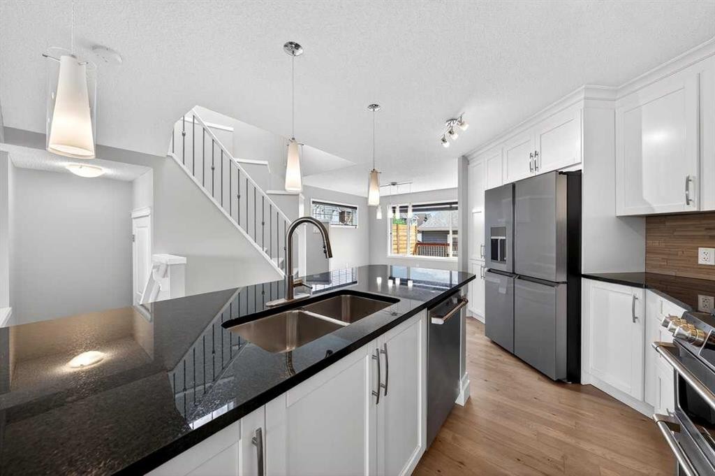 108 Auburn Crest Park Se, Calgary, AB - Indoor Photo Showing Kitchen With Stainless Steel Kitchen With Double Sink With Upgraded Kitchen