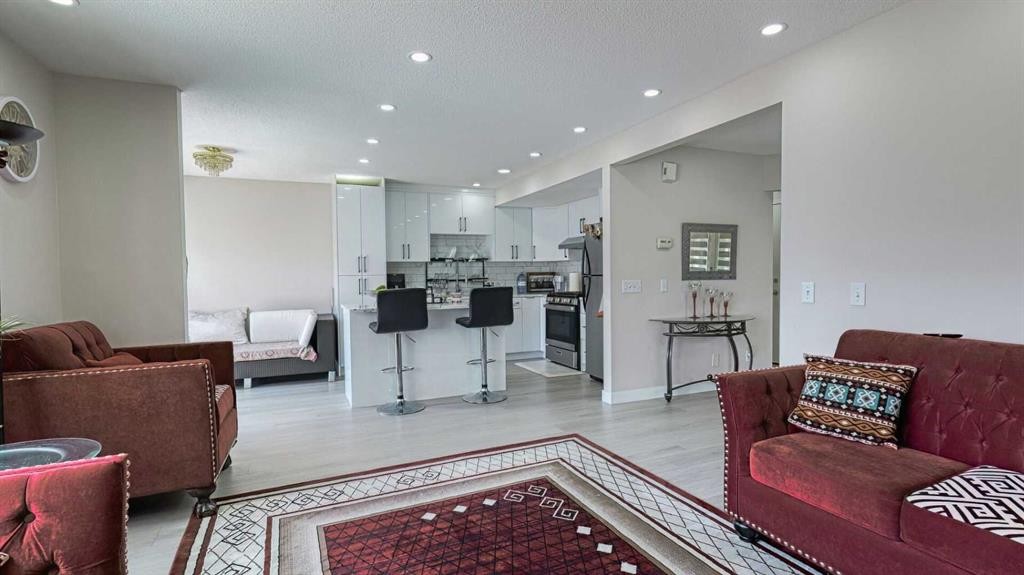 54 Saddlecreek Crescent Ne, Calgary, AB - Indoor Photo Showing Living Room