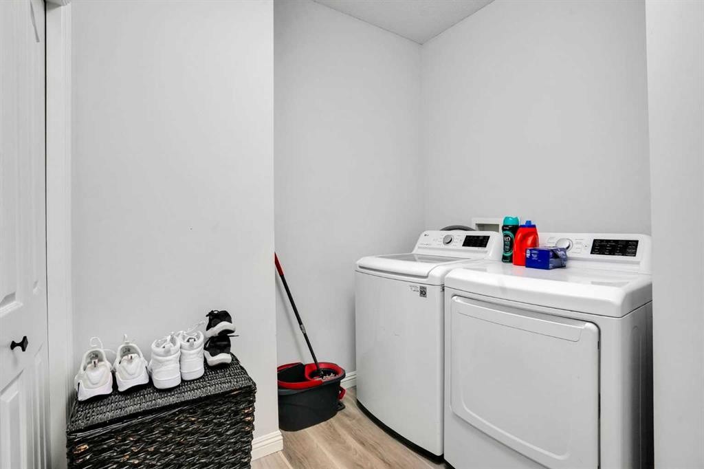 74 Cranleigh Green Se, Calgary, AB - Indoor Photo Showing Laundry Room