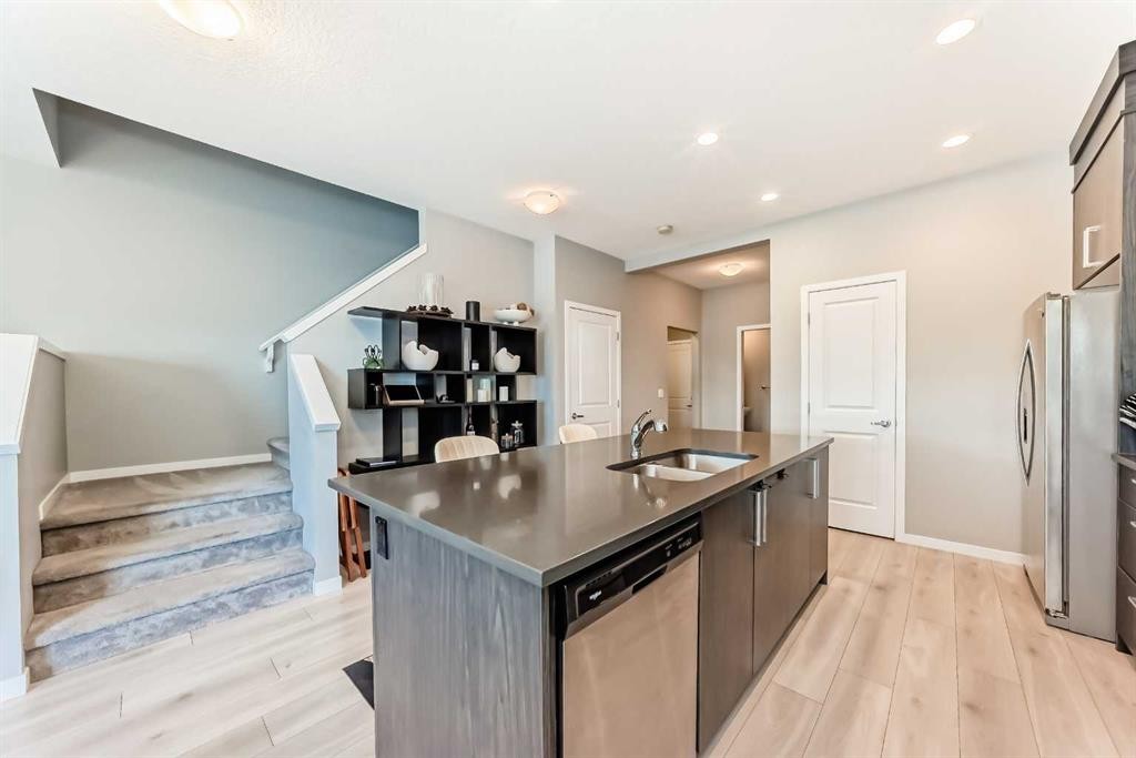 984 Seton Circle Se, Calgary, AB - Indoor Photo Showing Kitchen With Double Sink