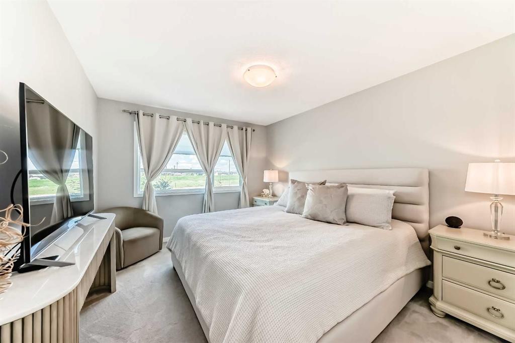 984 Seton Circle Se, Calgary, AB - Indoor Photo Showing Bedroom