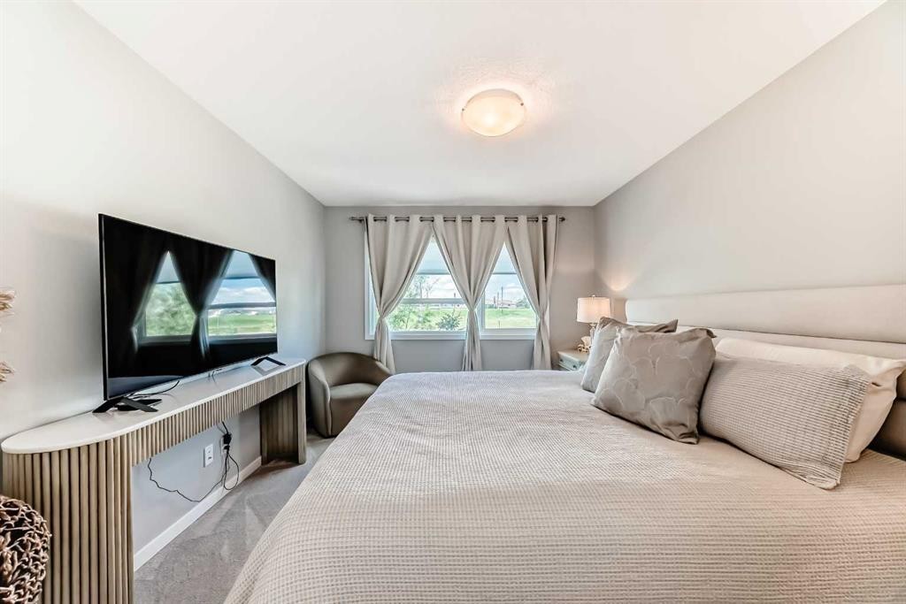 984 Seton Circle Se, Calgary, AB - Indoor Photo Showing Bedroom