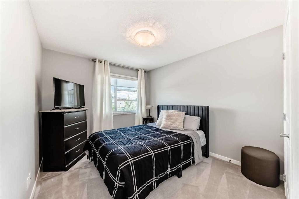 984 Seton Circle Se, Calgary, AB - Indoor Photo Showing Bedroom