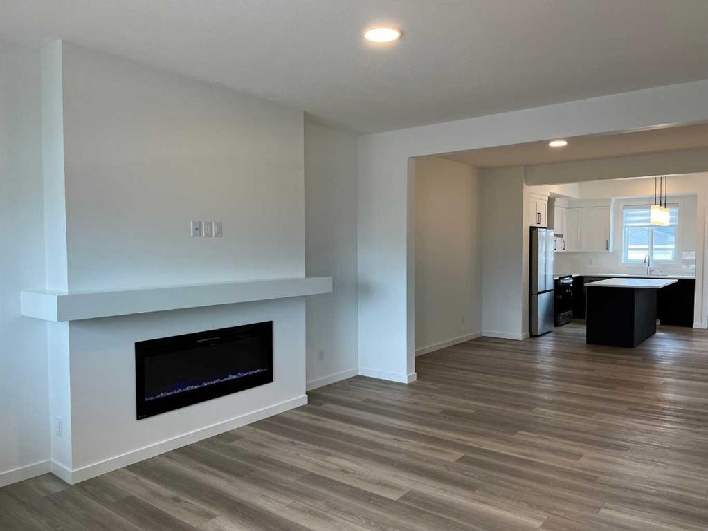 49 Legacy Point Terrace Se, Calgary, AB - Indoor Photo Showing Living Room With Fireplace