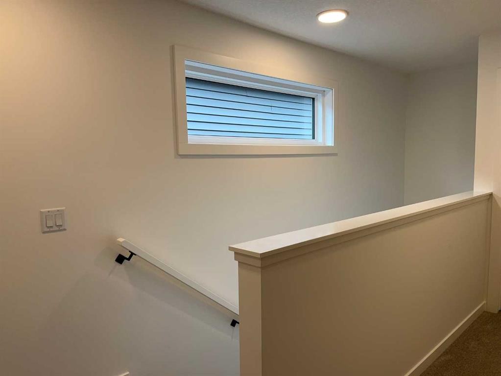 49 Legacy Point Terrace Se, Calgary, AB - Indoor Photo Showing Other Room