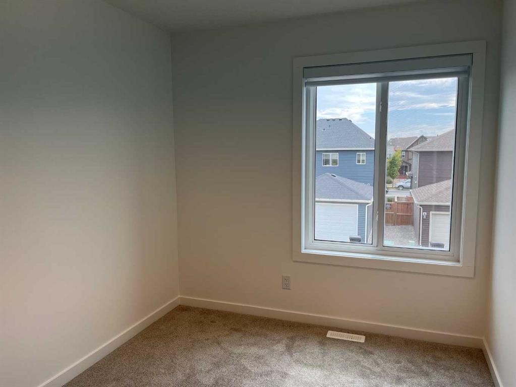 49 Legacy Point Terrace Se, Calgary, AB - Indoor Photo Showing Other Room