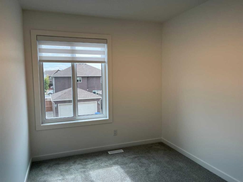 49 Legacy Point Terrace Se, Calgary, AB - Indoor Photo Showing Other Room