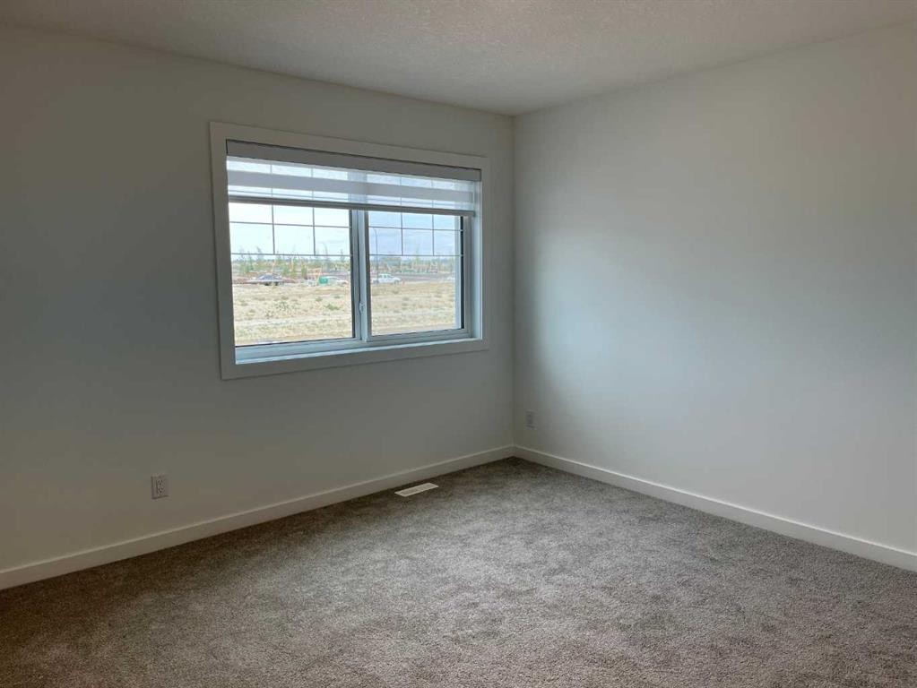 49 Legacy Point Terrace Se, Calgary, AB - Indoor Photo Showing Other Room