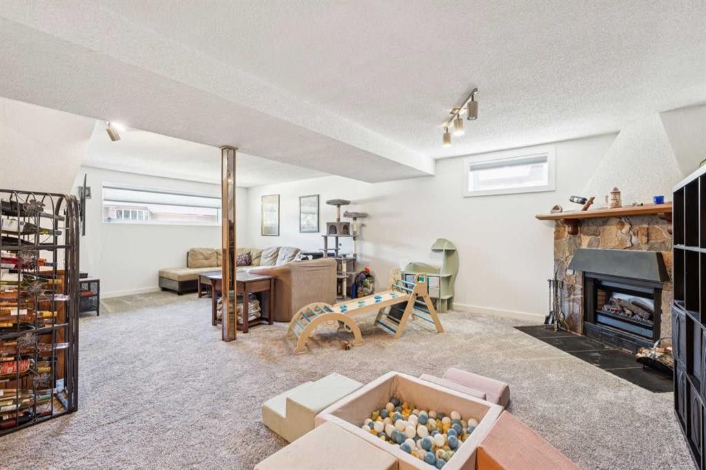 215 Silver Valley Rise Nw, Calgary, AB - Indoor With Fireplace