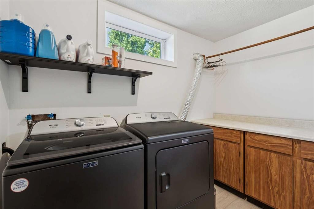 215 Silver Valley Rise Nw, Calgary, AB - Indoor Photo Showing Laundry Room