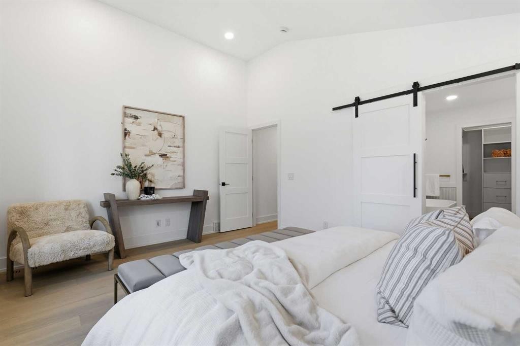 60 Lake Lucerne Close Se, Calgary, AB - Indoor Photo Showing Bedroom