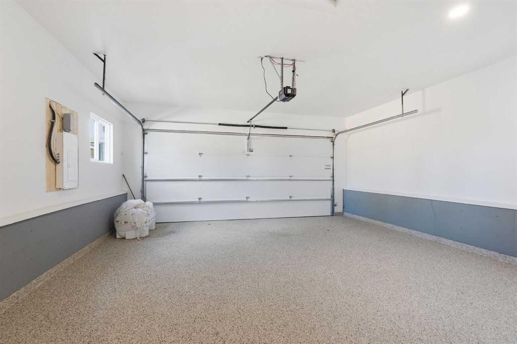 60 Lake Lucerne Close Se, Calgary, AB - Indoor Photo Showing Garage