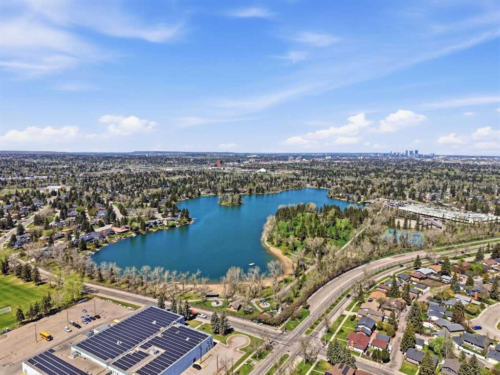 60 Lake Lucerne Close Se, Calgary, AB - Outdoor With Body Of Water With View