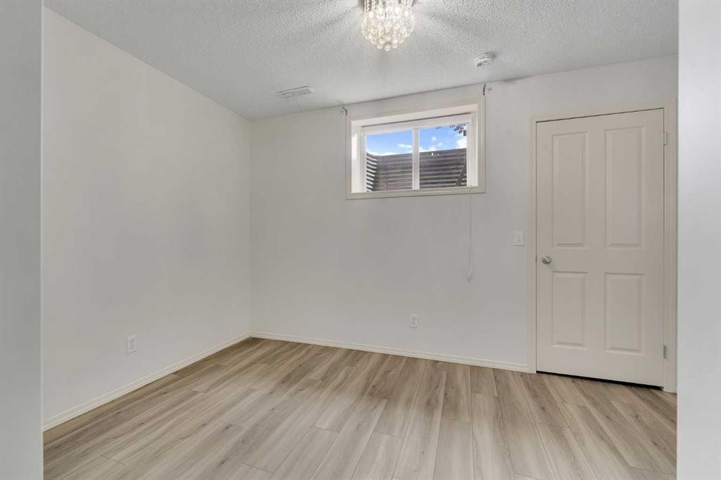 312 Saddlebrook Point Ne, Calgary, AB - Indoor Photo Showing Other Room