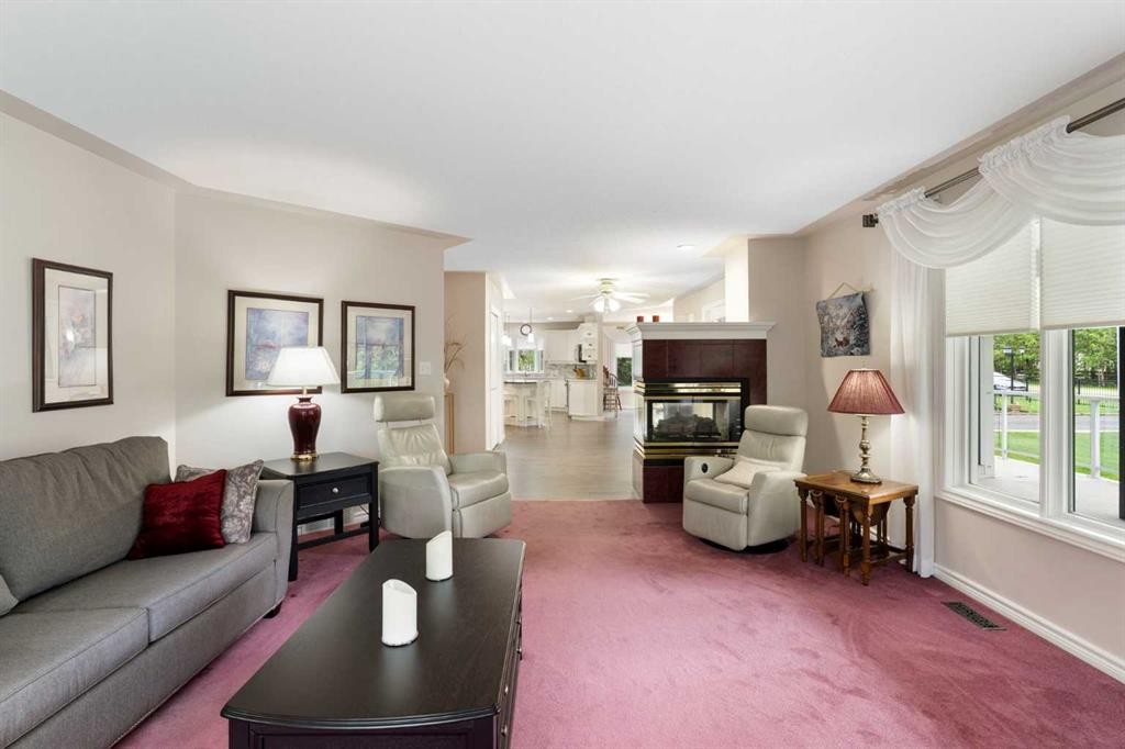 202-36214 Range Road 250, Rural Red Deer County, AB - Indoor Photo Showing Living Room