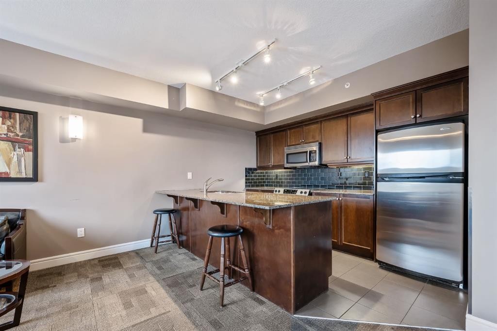 1005-910 5 Avenue Sw, Calgary, AB