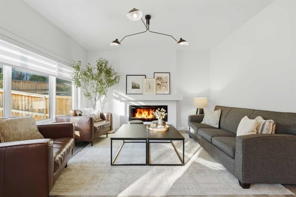 92 Heritage Hill, Cochrane, AB - Indoor Photo Showing Living Room With Fireplace