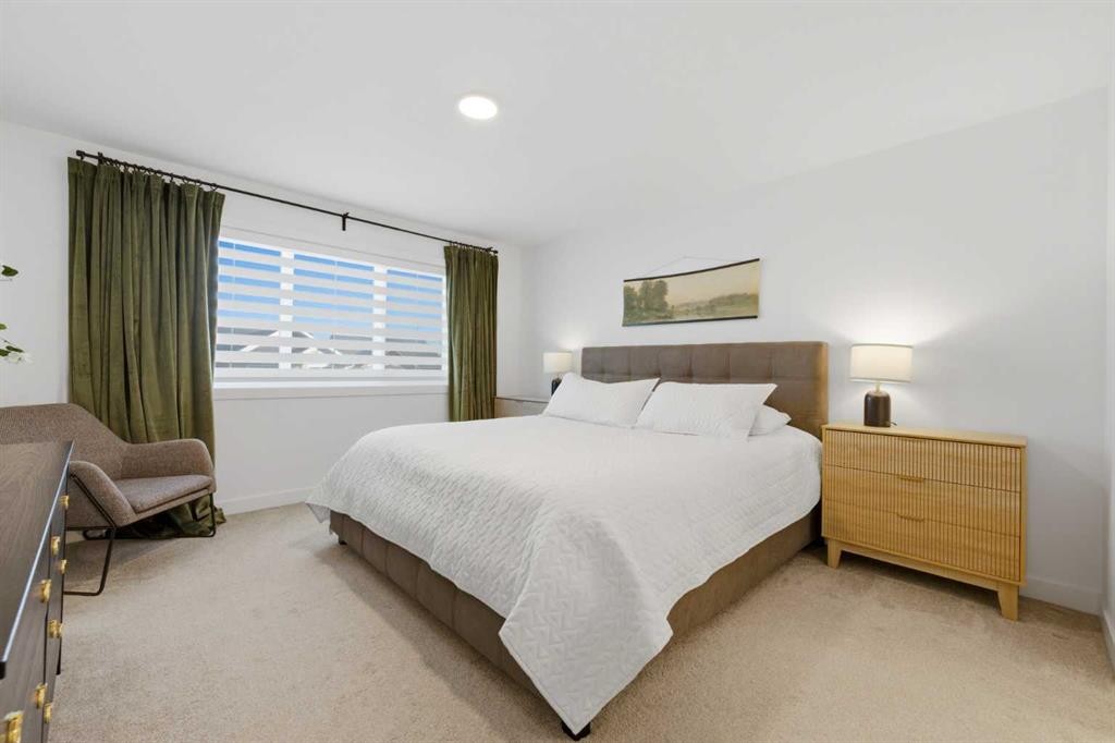 92 Heritage Hill, Cochrane, AB - Indoor Photo Showing Bedroom