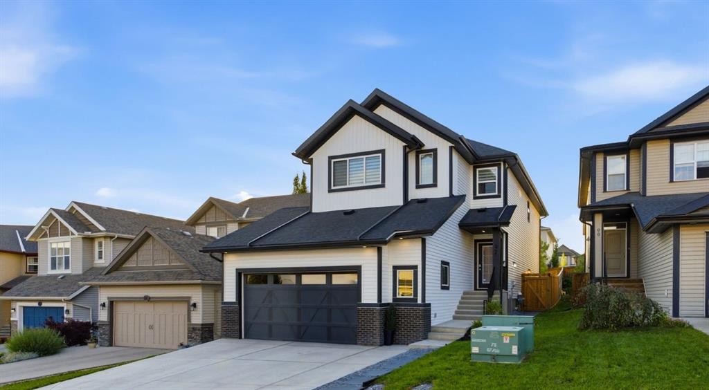 92 Heritage Hill, Cochrane, AB - Outdoor With Facade